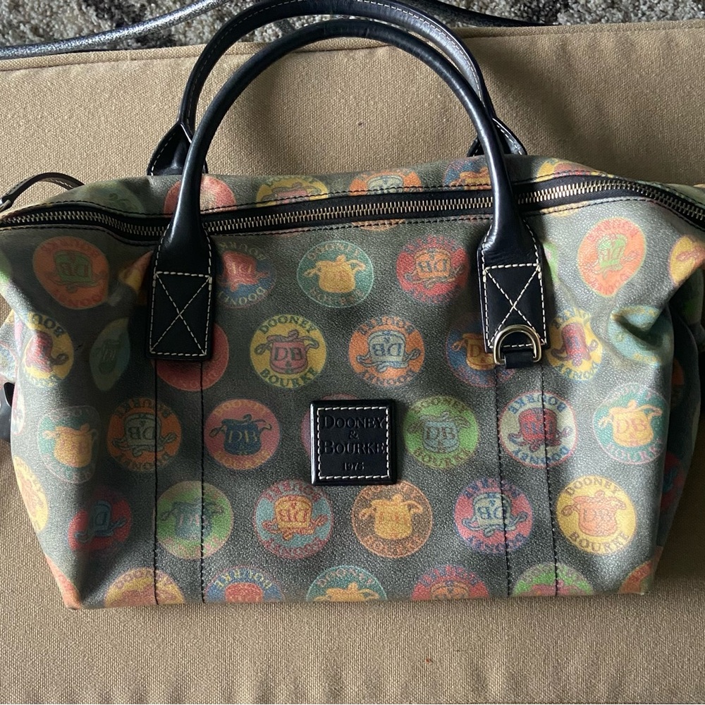 Dooney & Bourke Medallion Crest Logo Small Duffel Style Handbag